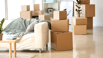 Organized move-in and move-out packing support with boxes in a home